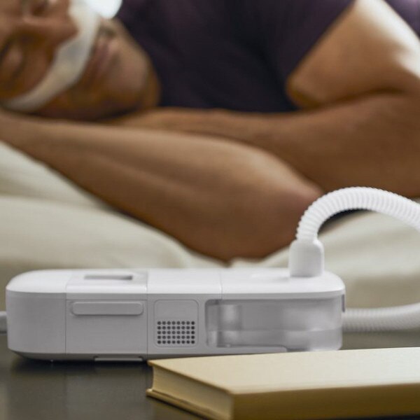 Man Asleep Using DreamStation Go